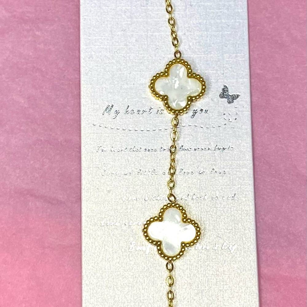 Gold and White Quatrefoil Bracelet with Modern Design